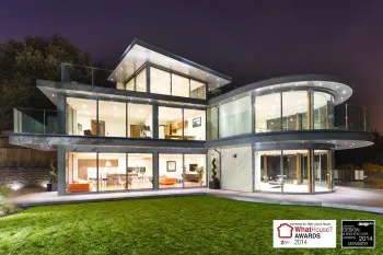 Minterne rear  night edited with logos